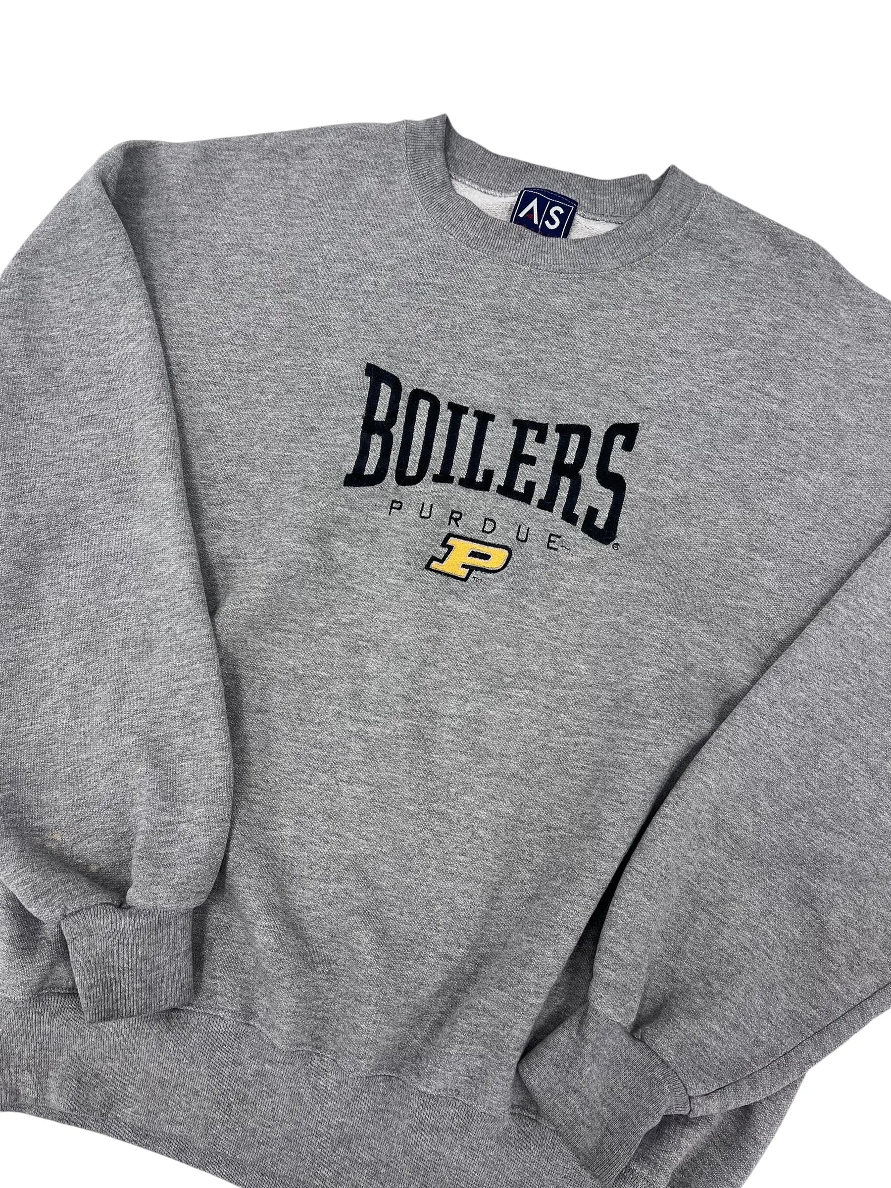 A heather gray crewneck sweatshirt featuring a black 'BOILERS' graphic with a yellow 'P' logo and 'PUGLIE' printed underneath, shown on a white background.