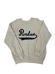 An off-white long-sleeve sweatshirt with 'Purdue' printed in navy blue script across the chest, laid flat on a white background.