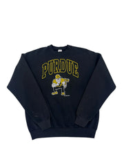 A folded black sweatshirt featuring a yellow 'PURDUE' graphic and a running football player mascot on the front, displayed against a plain white background.