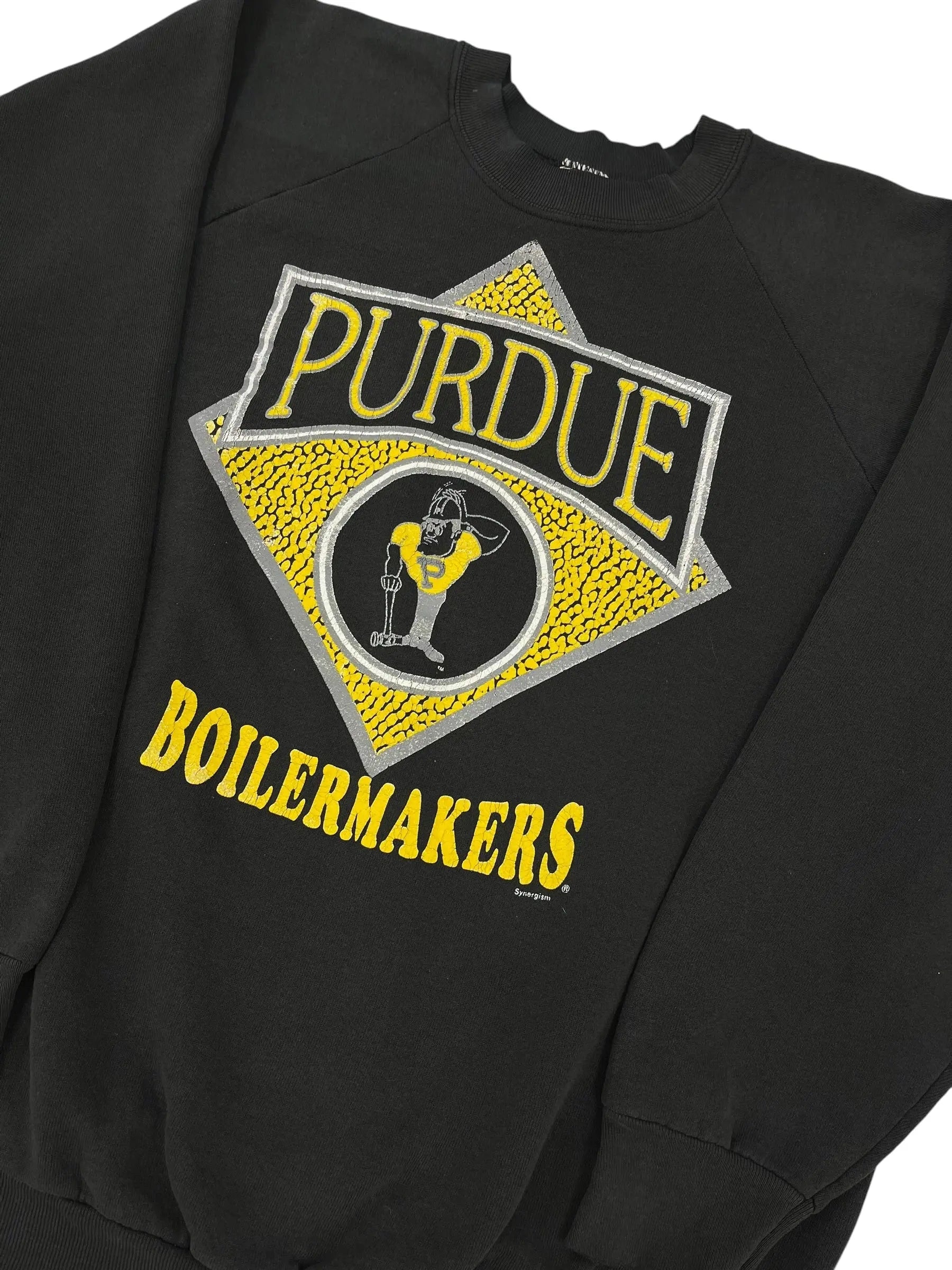 A black sweatshirt featuring a large Purdue Boilermakers graphic on the chest, with a yellow and gray diamond logo and yellow 'BOILERMAKERS' text.
