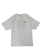 A white short-sleeve t-shirt laid flat on a white background, featuring a faint circular graphic on the front and a small red and black logo on the left chest.